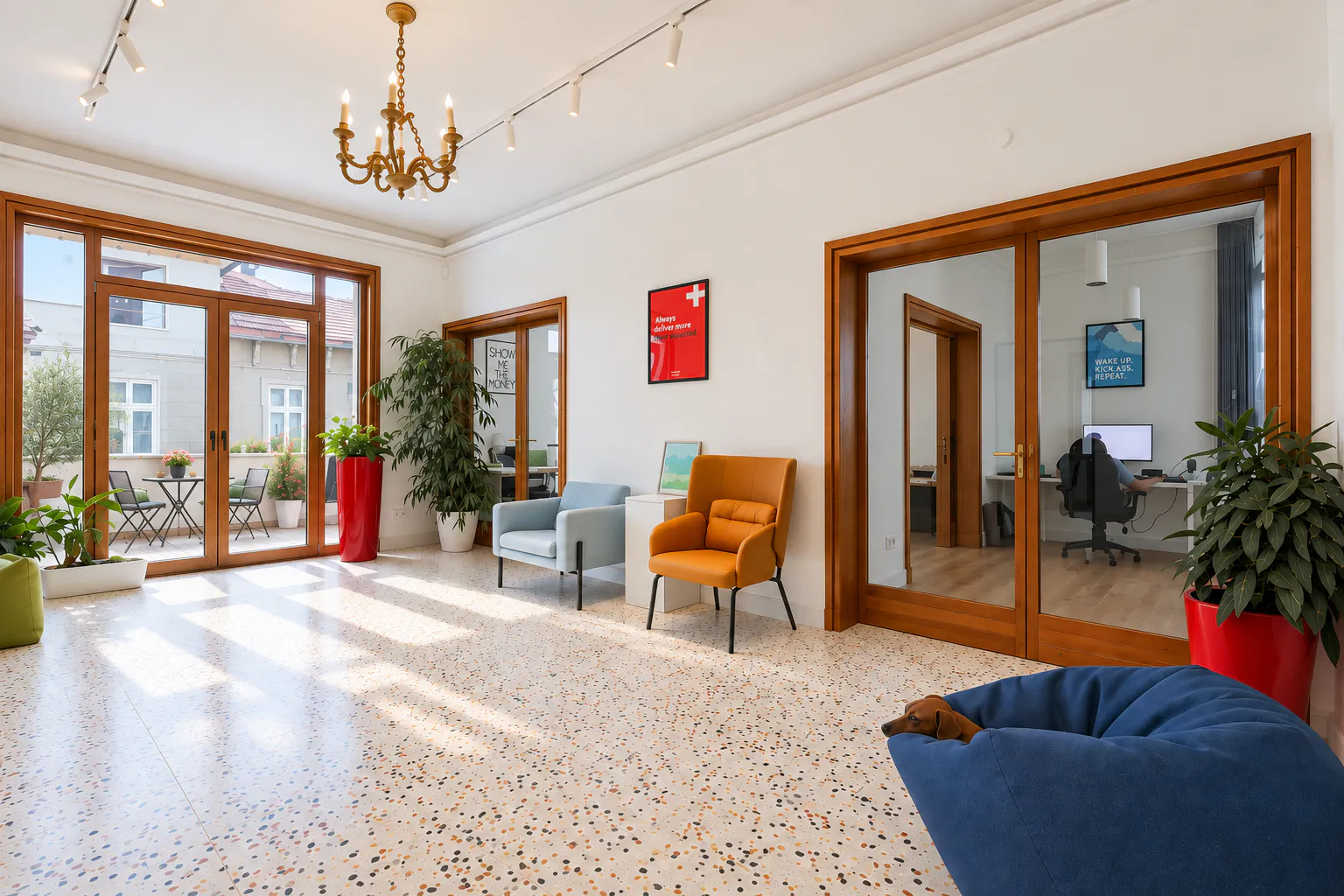 Lobby with a terrazzo floor, gilded chandelier and glazed wooden double doors to the terrace and offices